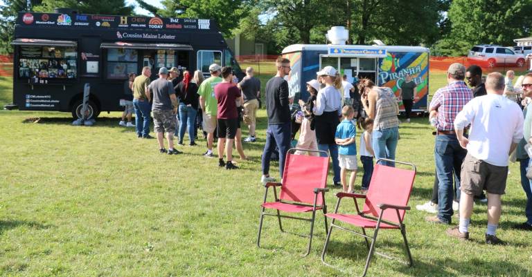 First in third annual series of Warwick Food Truck Festivals enjoys another success WARWICK. The next two-day event will be held Thursday and Friday, July 18-19. Photos by Roger Gavan Longer lines for this particular truck showed that a big hit this year was the very popular food truck operated by Cousins Maine Lobster.