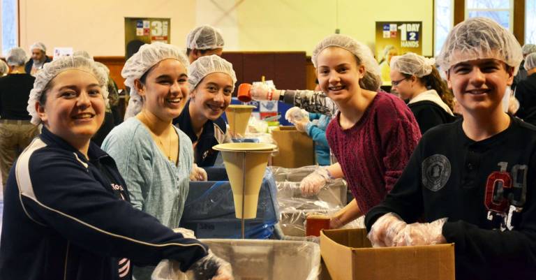 10,000 meals Photos by Cynthia Knecht Among the students in the religious education program at St. Josephís Church in the Village of Florida who organized the ìHelping Handsî food drive were, from left to right: Sara Wierzbicki, Emilia Knecht, Erin Sgombick, Rachel Behrent and Sam Knecht.