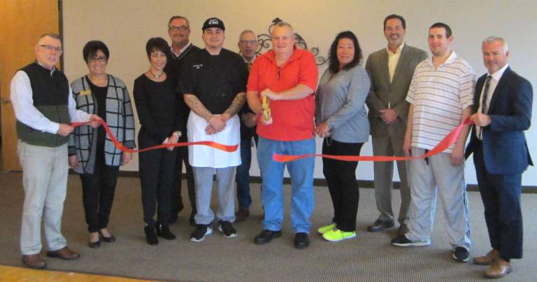 Hickory Hill food and beverage department management change Photo by Bea Arner On Nov. 1, Town of Warwick Supervisor Michael Sweeton (far left) and members of the Warwick Valley Chamber of Commerce came to Hickory Hill Golf Course and Hickory Hill Catering LLC for a ribbon-cutting ceremony in honor of its recent food and beverage department management change. Food and Beverage Director Robert Freeman and Executive Chef Phillip Dunn (center) were on hand to greet notable friends, family, employees and members of the community.