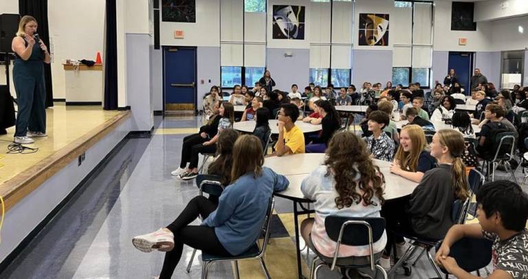 World beatbox champion empowers S.S. Seward students to use their voice Kaila Mullady performs for Florida students.