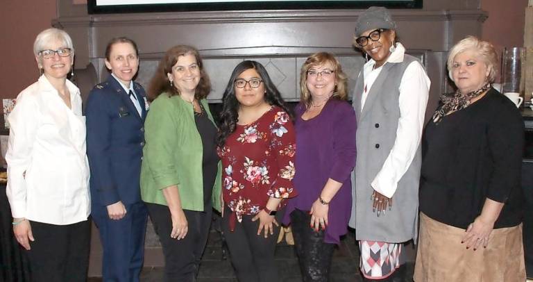 The Class of 2019 Women of Achievement of Orange County: Annie Colonna, Col. Denise Donnell, Amy Baldwin Littman, Janie Bravo (Young Woman of Future), Michele Winchester-Vega, Regina Brown, and Regina Cieslak.