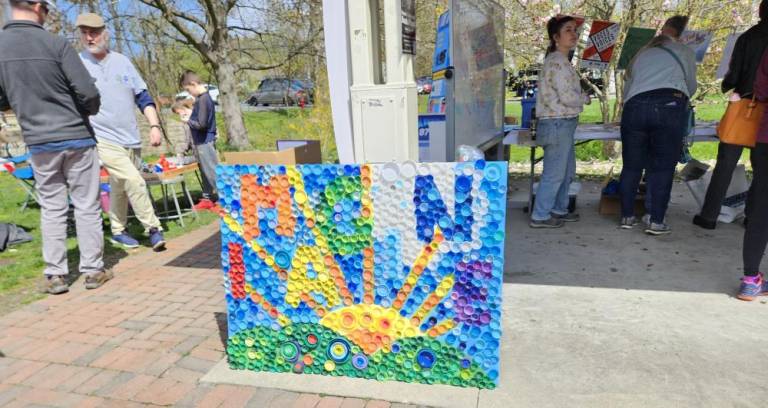 Bottle caps become art at Treecycle 2024.