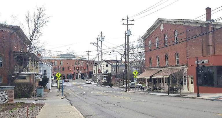 Looking from Oakland Avenue to Main Street, the lack of traffic and vehicles parked is a strange scene for a weekday afternoon.