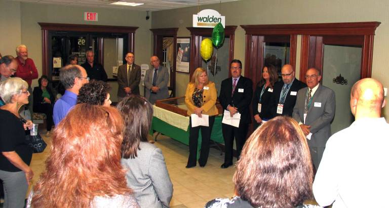 Walden Savings Bank celebrates fifth anniversary of Village of Florida branch office Photo by Roger Gavan On Nov. 6, public officials as well as members of the Florida and Warwick Chambers o officials f Commerce were among the dignitaries who joined Walden executives, their staff and clients to celebrate the fifth anniversary of the Florida branch office. Bank officials from left, Branch Manager Laura Gramazio, CEO Derrik Wynkoop, Area Retail Manager Nicola Folina, Walden Vice President John Carola and Chairman of the Board Jeff Crist.