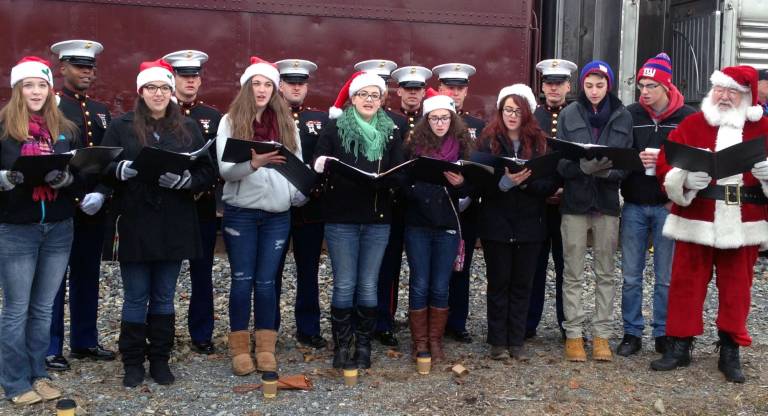 Toys for Tots Train arrives in Warwick The Warwick Valley High School Meistersingers sang Christmas carols.