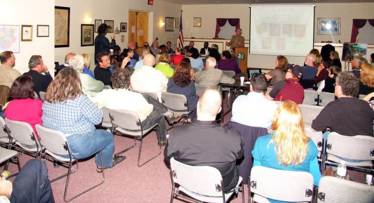 Photo by Roger Gavan Michael Johndrow, executive director of the Warwick Valley Chamber of Commerce, fielded questions from the audience.