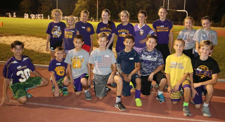 Under the lights Seventeen members of the Warwick Valley Middle School’s Mileage Club participted in the Friday Night Lights Half-Mile Run on Oct. 6.