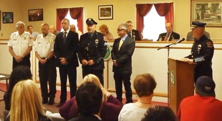 Beyond duty Provided photo From left, EMTs Frank Cassanite and Bobby Lemin, New York State Police Investigator Russell Fragale, Warwick Police Detective Sgt. Alton Morley and retired Warwick Police Officer Brett Lukach are recognized for the work they did on the morning of Dec. 21, 2018, when called to help little Riley Mosher. Police Chief Thomas McGovern is at the podium at right.