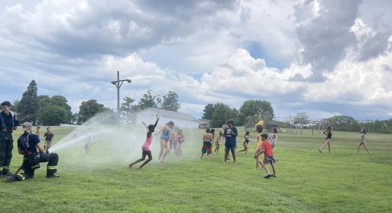 Warwick fire fighters become campers’ heat wave heroes Warwick fire fighters become campers’ heat wave heroes