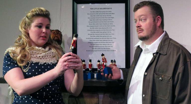 Agatha Christie mystery opens at The Playhouse at Museum Village on May 2 Pictured are Alexis Gray and Mark Von Oesen inspecting the 10 figurines that are such a pivotal part of the Agatha Christie mystery, "And Then There Were None," which opens for nine performances on May 2 at The Playhouse at Museum Village in Monroe.