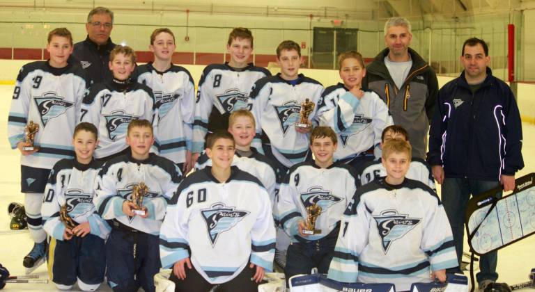 Ramapo Saints win big in Rhode Island in preparation for the N.J. State Hockey playoffs Photo by John Havey Members of the Ramapo Saints Pee-Wee hockey team, which won the Ocean State Classic held in Rhode Island last weekend, are from left to right, standing: Cole Garabed, Head Coach Steve Pelosi , Donnie Feldman, Conor Havey, Ryan Molota, Matt Cavallaro, Nick Pelosi, Coach Steve Garabed and Coach Paul Cavallaro; and kneeling: Aaron Bohlinger, Mark Amatetti, Dante Durante, Rhett Padgett, Mike Sacchi, Mike Harmancin and Noah Daigle. Justin Betcher and Coach Rob Molota were not available for the photo.