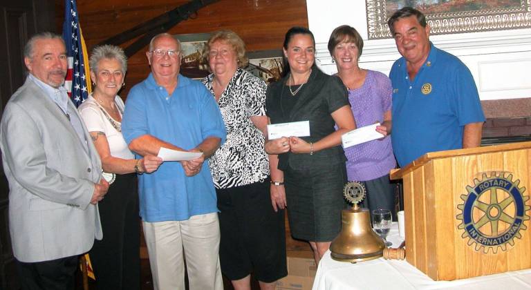 Rotarians assist food pantries Rotarians assist food pantries