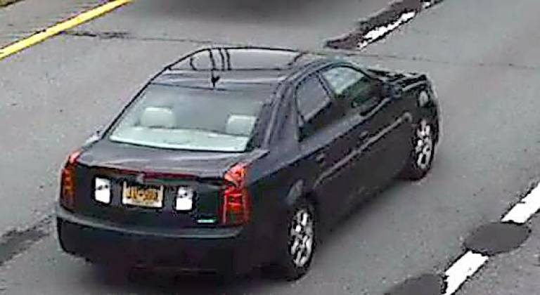 Gardiner. State police are investigating counterfeit bills being passed in the Hudson Valley State Police say driver of this black Cadillac has been known to pass the counterfeit bills in the Village of Florida in Orange County.