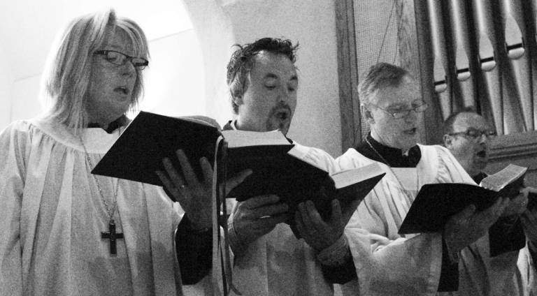 ‘Festival of Lessons & Carols’ on Dec. 23 Photo by Deborah Schofield: Christ Church Choir members Ellen Metzger, Brian Gens, Phil McCutcheon and Steven Wing will perform with the rest of the choir and Jubilate at ìA Festival of Lessons and Carolsî on Sunday, Dec. 23.