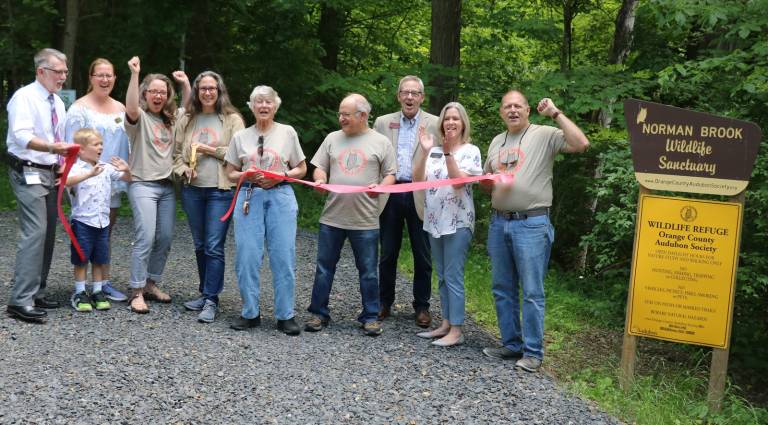 Now open for quiet study of wildlife Photo by Roger Gavan On Thursday, June 6, Town of Warwick Supervisor Michael Sweeton (far left), members of the Orange County Audubon Society and the Warwick Valley Chamber of Commerce held a ribbon cutting ceremony to celebrate the re-opening of the Norman Brook Wildlife Sanctuary.