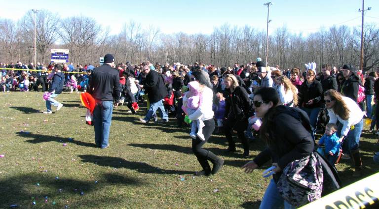 In search of the golden eggs And they're off! After last-minute instructions and at the sounding of a siren, the children were off and hunting, not only for the ordinary goodies, but also for three þÄúgolden eggs.þÄù Each one of these entitled the lucky child to a special gift bag.