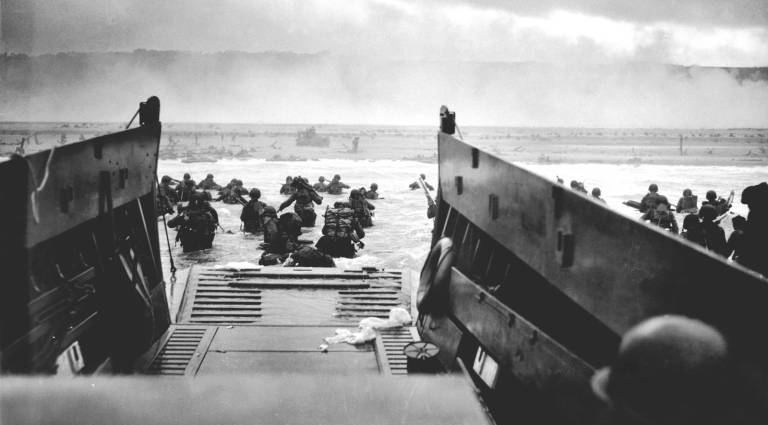 Chief Photographer's Mate Robert F. Sargent, U.S. Coast Guard A LCVP (Landing Craft, Vehicle, Personnel) from the U.S. Coast Guard-manned USS Samuel Chase disembarks troops of the U.S. Army's First Division on the morning of June 6, 1944 (D-Day) at Omaha Beach.