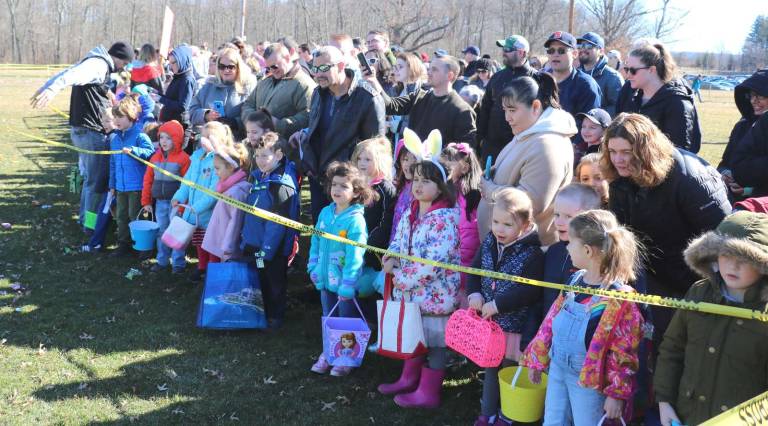 Eleventh annual Village Easter Egg Hunt held March 31 at Veterans Memorial Park Photos by Roger Gavan About 15 minutes before the start of the egg hunt, all the children were lined up in three age groups: seven to 12, four to six and three and under.