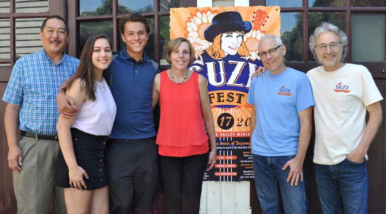 Suzy Fest is a community success The Yuen family, at left, were the recipents of the funds raised by Suzy Fest. They were overwhelmed by the community's generosity and have pledged to be part of Suzy Fest in 2018.