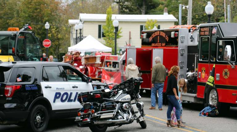 Village of Warwick celebrates First Responders Day Photos by Roger Gavan A visitor to the Village of Warwick on Saturday, Oct. 14, might have understandably assumed that police, fire apparatus and personnel had just responded to a serious emergency on Railroad Avenue. But he or she would soon discover that this was just “First Responders Day,” sponsored by the Village Sesquicentennial Committee to honor the Warwick Fire Department, the Warwick Emergency Medical Service, the Warwick Police Department and the Village of Warwick Department of Public Works.