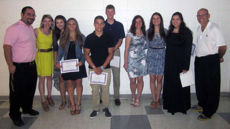 Warwick Valley Teachers Association award scholarships Pictured from left to right are: Carlos Barquero (WVHS Spanish Teacher), Kelli Sciarra (WVHS mathematics teacher), Allyson Yates, Gabrielle Trimlett, Joseph Ginely, Daniel Kelly, Angela Volpe, Kathryn Fernandez, Gianna Rotondo and Robert Slutsky (WVMS ELA and science teacher).