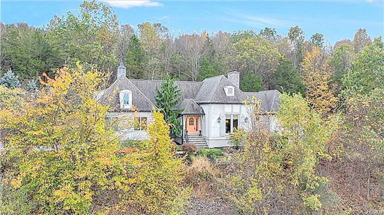 This chalet-like home is very private and, indeed, very French influenced This chalet-like home is very private and, indeed, very French influenced