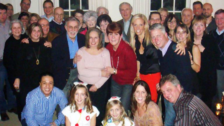 Friends and family celebrate two milestones in Arlene Brunos life Arlene Bruno is pictured here with at her surprise 70th birthday party surrounded by her family and friends.
