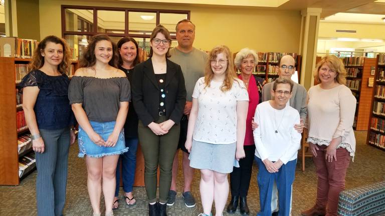 Provided photo Albert Wisner Public Library Foundation scholarship recipients with sponsors and family. Pictured from left to right are: Kristine Kent, Ashley Emmanuel, Jeannine Emmanuel, Paige Kent, Steve Kent, Abigail Gurvich, Hope Arber, Glenn P. and Susan D. Dickes and Nora Aman-Gurvich.