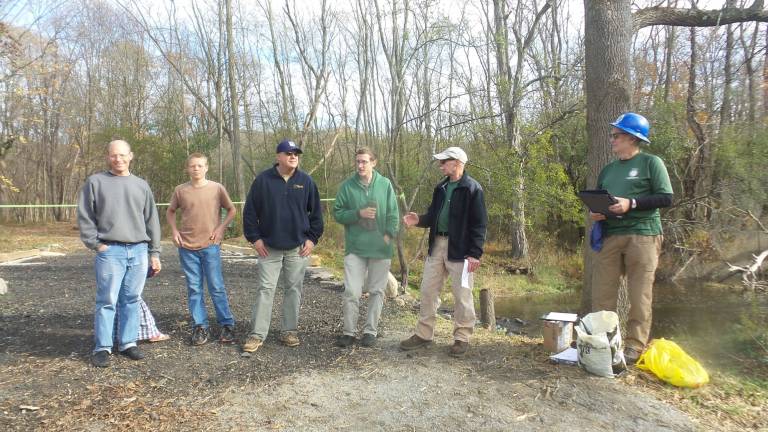 Rotten, broken, dangerous Goosepond bridge is repaired All Bruderhof Belleville Community members received awards for their help and assistance during the project (from left): Arno Wright, Bruderhof Bellevale Community; Arno’s son, Wilfred Wright, Bruderhof Bellevale Community; John Burleson, Bruderhof; Colin Wright, Bruderhof; Bob Fuller, crew leade (Photo by Frances Ruth Harris)