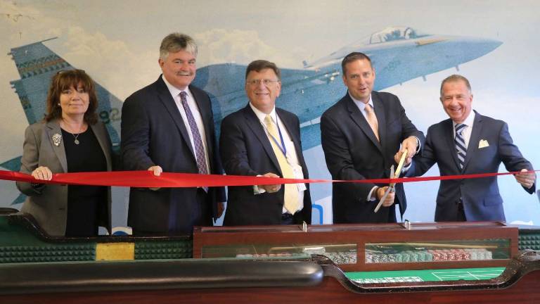 Resorts World Catskills casino dealer school opens at Stewart Airport Provided photo Lynn Cione, the President and CEO of the Orange County Chamber of Commerce, Orange County Legislator Kevin Hines, Ed Harrison, General Manager of Stewart International Airport, Orange County Executive Steven M. Neuhaus and Charles Degliomini, Executive Vice President of Empire Resorts Ed Harrison, at the ribbon-cutting on Sept. 7 to celebrate the opening of the new Resorts World Catskills casino dealer school and educational center at Stewart International Airport in Newburgh to celebrate the opening of the new Resorts World Catskills casino dealer school and educational center at Stewart International Airport in Newburgh.