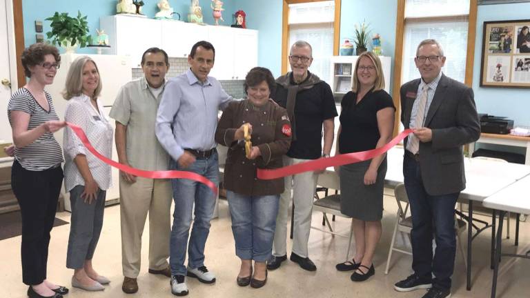 Vanessa's Cake Designs celebrates grand opening of studio in Warwick Photo by Bea Arner On Friday, Aug. 3, members of the Warwick Valley Chamber of Commerce joined owner Vanessa Greely (center) and her family to celebrate the opening of the Vanessa's Cake Designs studio on Southwyck Lane and announcing her classes, which are offered by appointment.