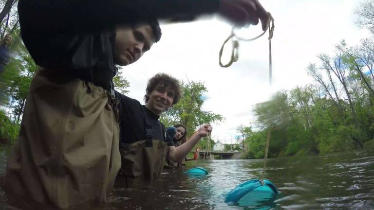 Microplastics all around us Students volunteering for the Beacon Institute netting microplastics in Fishkill Creek.