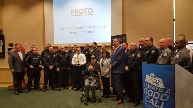 Don't drive drunk: Free cab rides start at 4 p.m. today Law enforcement officers join the Alert Cab launch on Dec. 28 (Photo provided)