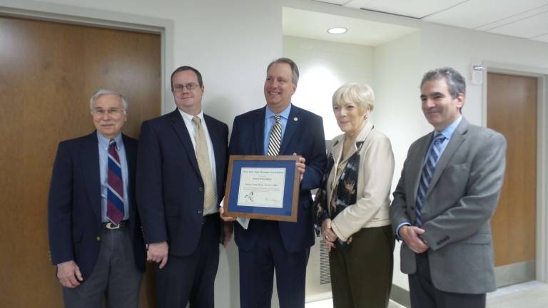 District attorney is honored by state humane association From left: Dr. Harry Hovel, board chair, NYS Humane Association; Christopher Borek, Orange County Chief Assistant District Attorney; David Hoovler, Orange County District Attorney (holding his award); Patricia Valusek, president, NYS Humane Association; and Marc Kissel, attorney and board member, NYS Humane Association (Photo by Frances Ruth Harris)