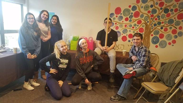 Chabad teens honor Parkland victims with acts of kindness Several Chabad CTeen Orange chapter members are pictured with the 17 packages they created in honor of the 17 victims in Parkland (Photos courtesy of Rabbi Pesach and Chana Burston/Chabad Orange)