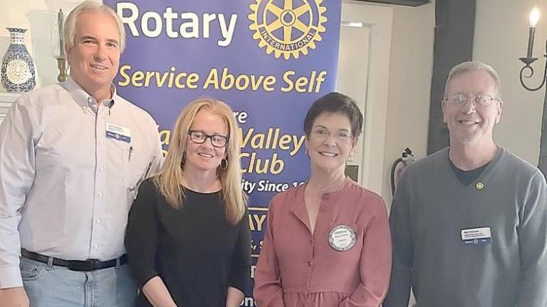 Shown, left to right, are Leo R. Kaytes, club president; Cindy Vander Plaat, funeral home co-owner and hospital events planner; Deborah Giuliani, a retired educator and community volunteer; and Neil Sinclair, three time past Warwick Rotary president, who performed the installation ceremony.