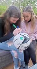 Molly Berman of Warwick and Yirshalem Pinkus of Sugar Loaf work together to design a summer-themed soccer ball for local children with special needs. Photos provided by Chabad of Orange County.