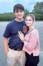 Warwick firefighter Michael Velez-Cosgrove, pictured here with his girlfriend, graduated Tuesday evening from the Orange County Fire Training Center’s Interior Fire Operations Course. Photos provided by the Warwick Fire Department.