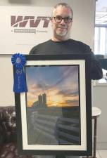 First-place winner Angelo Marcialis, whose photo titled “Farm Portraits,” will grace the cover of the new WVT telephone directory.
