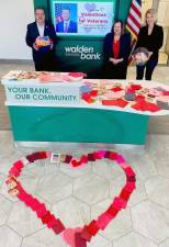 Walden Savings Bank President Derrik Wynkoop (l), Vice President Joann Menendez and Maria Ingrassia, Director of Intergovernmental Affairs for U.S. Representative Pat Ryan participate in the “Valentines for Veterans” program.