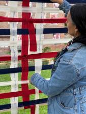 Artist Rachel Olivia Berg will lead ‘A Flag of Many Voices’ workshop where participants will use strips of fabric to create a woven flag.