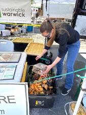 Visitors to the Warwick Farmers Market can bring their scraps for composting through Sustainable Warwick’s program.