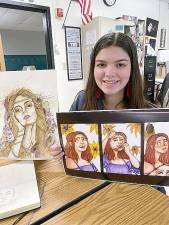 Warwick Valley High School sophomore Erin Eicher and a small sample of her art work.