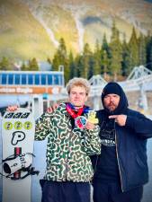 Max Fox Rabdau at the 2026 USASA National Championships in Copper Mountain, CO with his coach Will Rivera of Syndicate Worldwide Coaching.