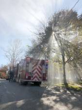 Sun breaks through trees at as the Warwick Fire Department confronts a brush fire at St Anthony Community Hospital on Saturday morning. Photos provided by the Warwick Valley Fire Department.
