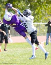 O’Dell Beckham has nothing on Warwick’s Ryan McLaughlin as McLaughlin goes airborne for another acrobatic catch for the Wildcats.