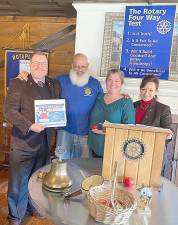 Shown, left to right, are Rotary President-elect Ed Lynch, who also is “Bowl for a Cause” co-chair with Dr. David Dempster; Rotary Community Service Director Wayne Patterson; guest speaker Jennifer Ocasio; and Warwick Rotary President Tina Buck.