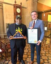 Manolin Tirado (left) with Sen. James Skoufis.