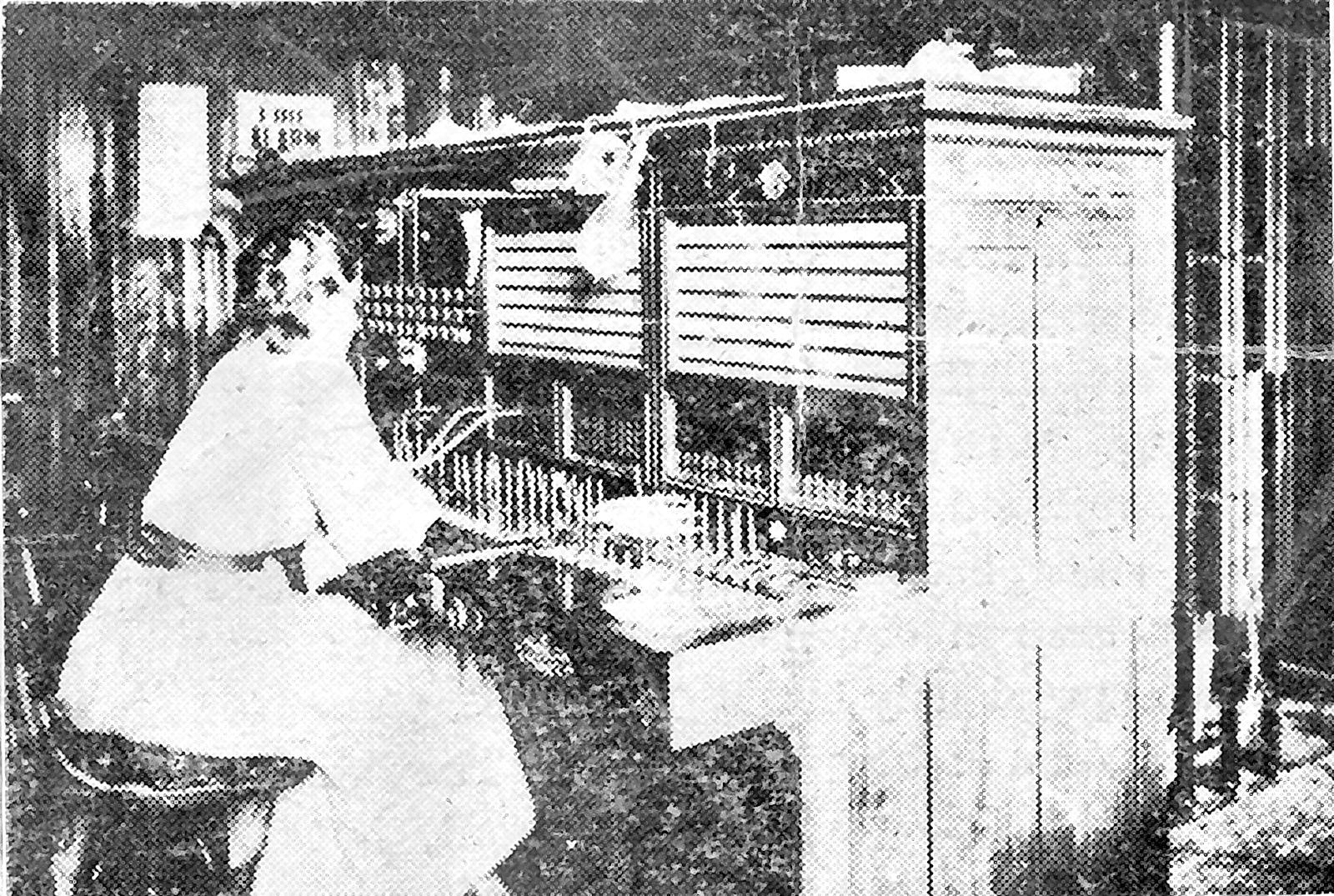 This original 1907 photo of the telephone operator in the Finch building - 47 Main Street