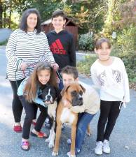 Early arrivals: Diane Ricco and her children Angelo, Isabella, Gianna and Nicholas were first to arrive with their boxers, Max and Rocky.